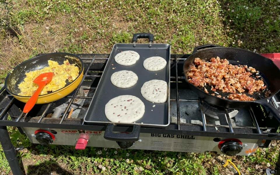 Outdoor cooking breakfast while camping